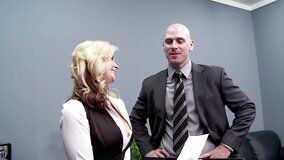 A blonde gets her tits and pussy licked in the office by her boos