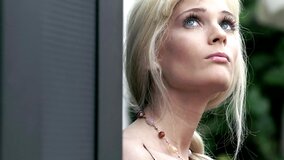 A blonde with blue eyes that loves to fool around is masturbating